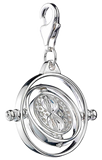 Silver pendant with a rotating design on a transparent  background