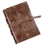 Brown leather journal with embossed designs and 'The Deathly Hallows' text on a white background
