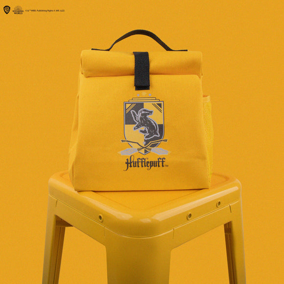 Yellow square bag with Hufflepuff logo on yellow metal stool with yellow background