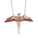 Rose gold necklace with a parrot-shaped pendant on a white background