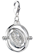 Silver pendant with a rotating design on a transparent  background